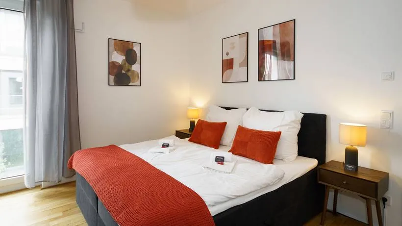 Apartment im Boutique-Stil mit Terracotta-Akzenten – Schlafzimmer 1