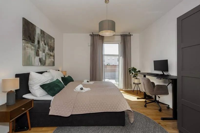 Apartment im Boutique-Stil mit Grün-Akzenten – Schlafzimmer 1