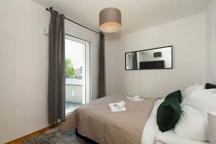Apartment im Boutique-Stil mit Grün-Akzenten – Schlafzimmer 3