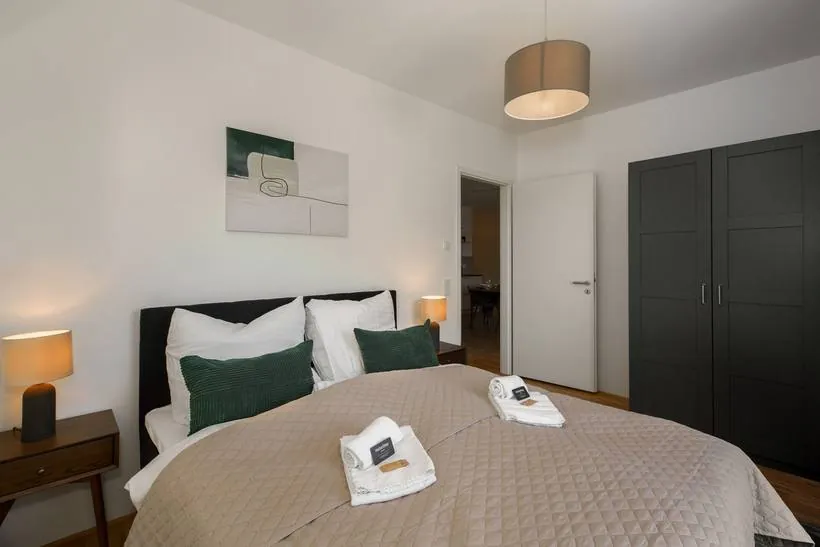 Apartment im Boutique-Stil mit Grün-Akzenten – Schlafzimmer 3