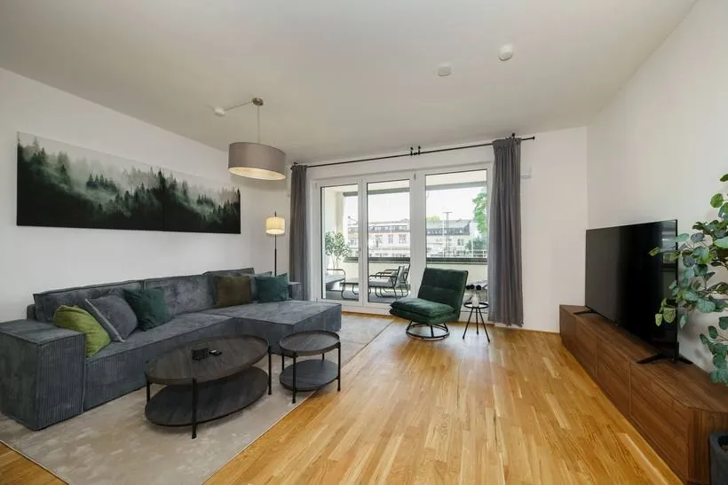 Apartment im Boutique-Stil mit Grün-Akzenten – Wohnzimmer
